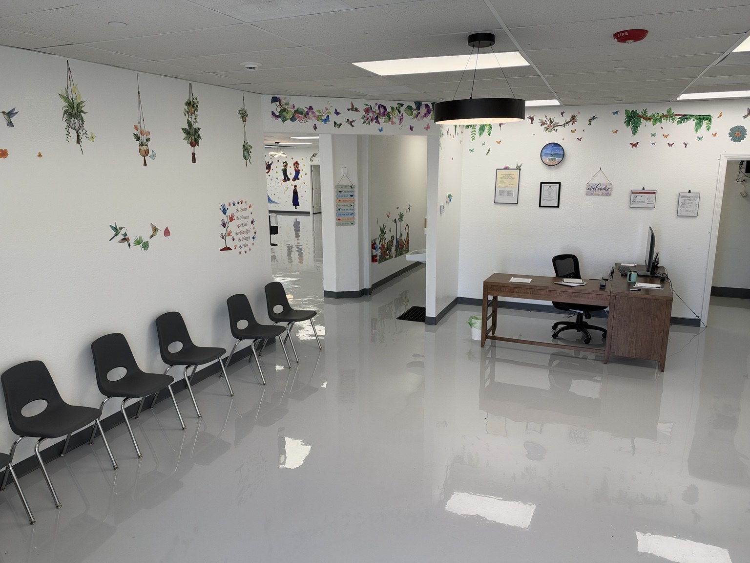 Welcome area with seating and a reception desk